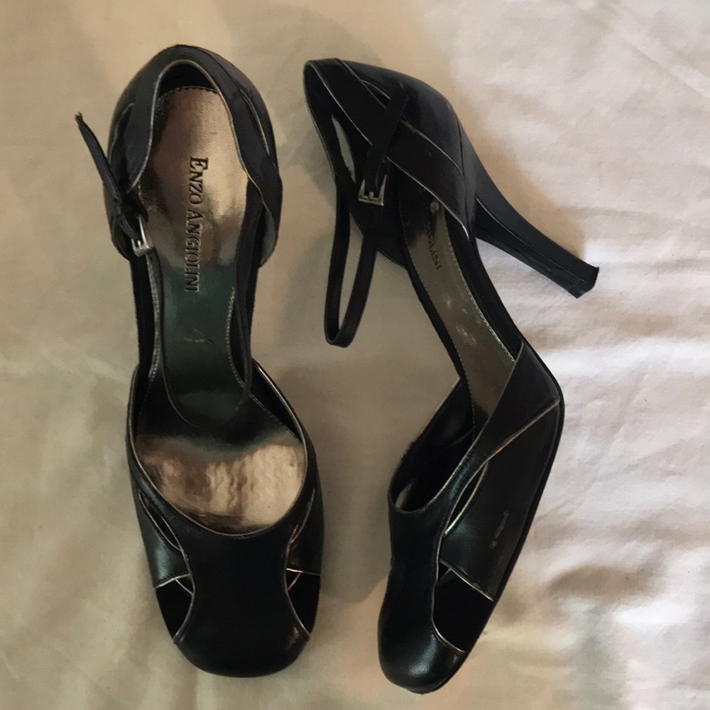 Black with thin metallic trim and ankle strep heel